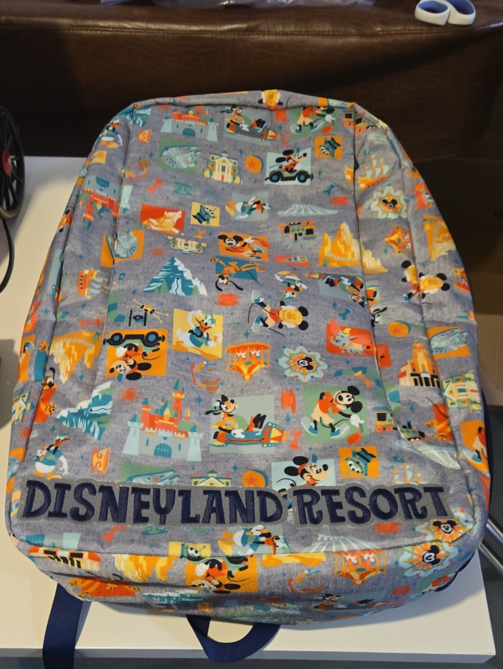Disneyland Resort Printed Backpack — Gray with Orange & Blue Characters